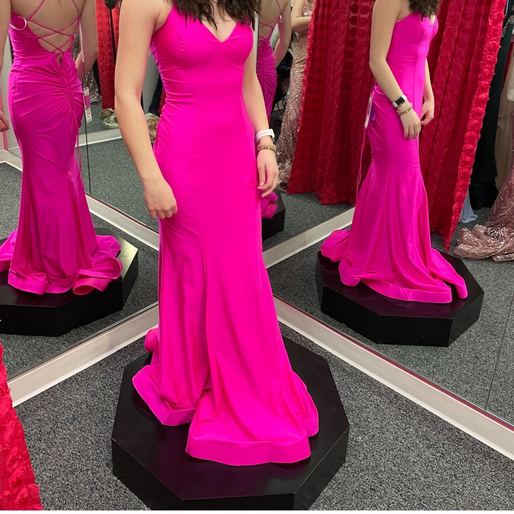 My prom dress from last year. Size 4 hemmed to be a size 2. I bought for $400.